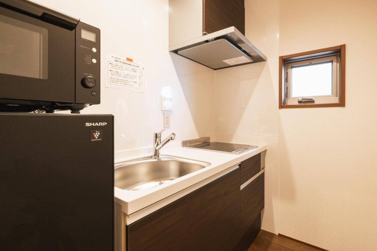 Апарт отель Grand Base Hakata Gofuku Фукуока Экстерьер фото